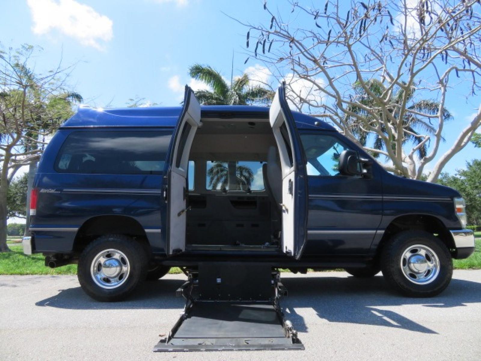 2011 Dark Blue /Gray Ford E-Series Wagon E-350 XLT Super Duty (1FBNE3BS4BD) with an 6.8L V10 SOHC 20V engine, located at 4301 Oak Circle #19, Boca Raton, FL, 33431, (954) 561-2499, 26.388861, -80.084038 - Photo #1